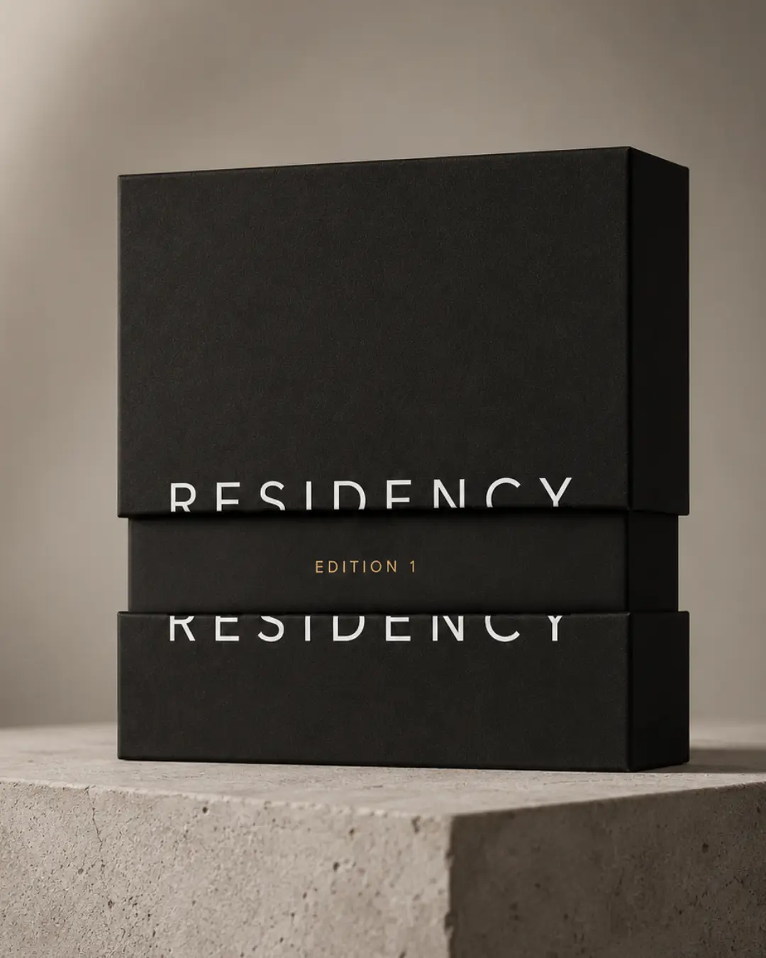 Black Residency Edition 1 presentation box on a concrete plinth