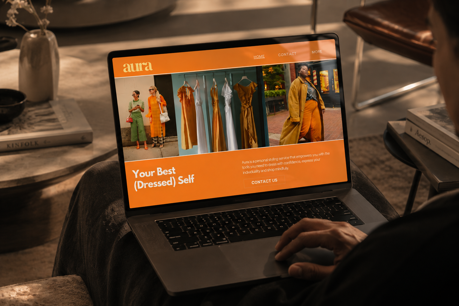 The Aura website open on a laptop reading Your Best (Dressed) Self