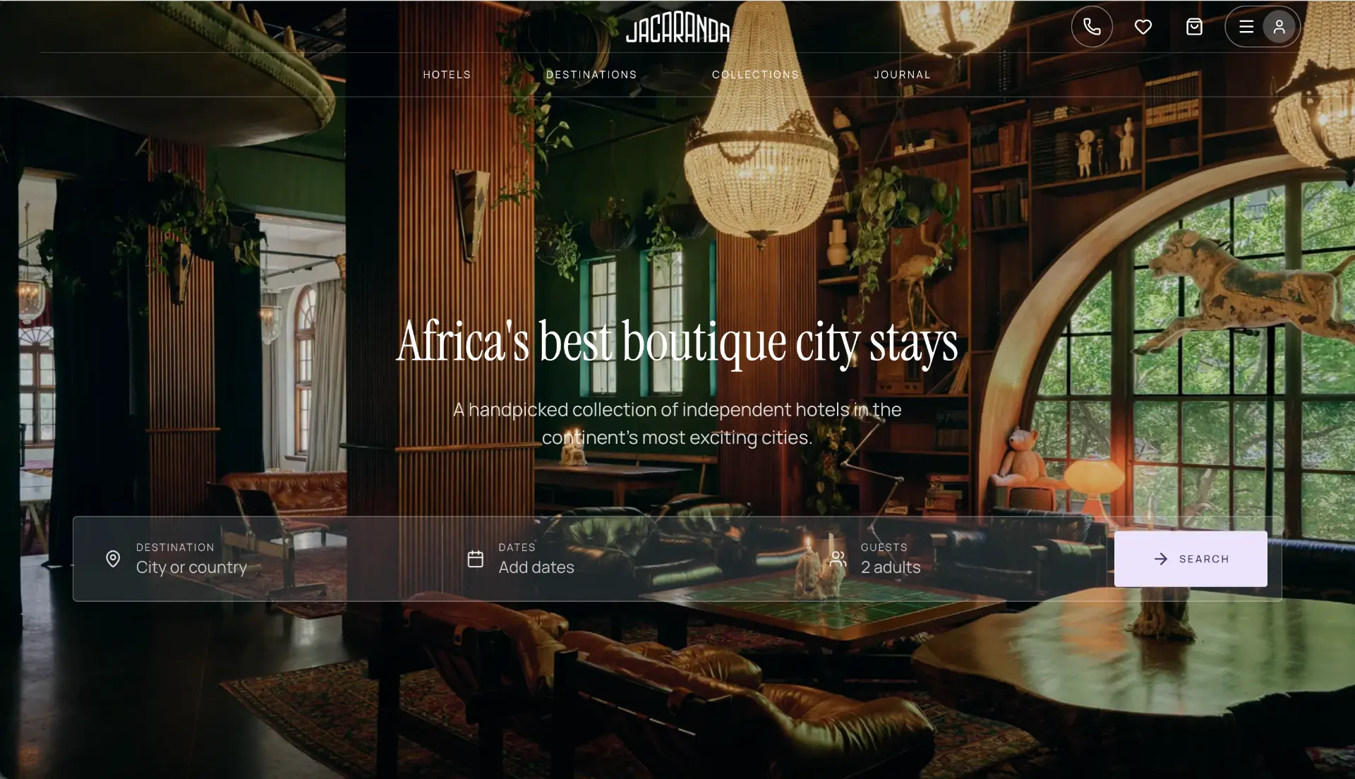 The Jacaranda homepage reading Africa's best boutique city stays over a hotel library interior