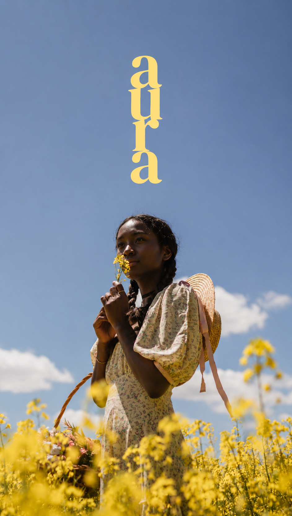 Aura campaign image of a woman in a field of yellow flowers beneath the Aura wordmark