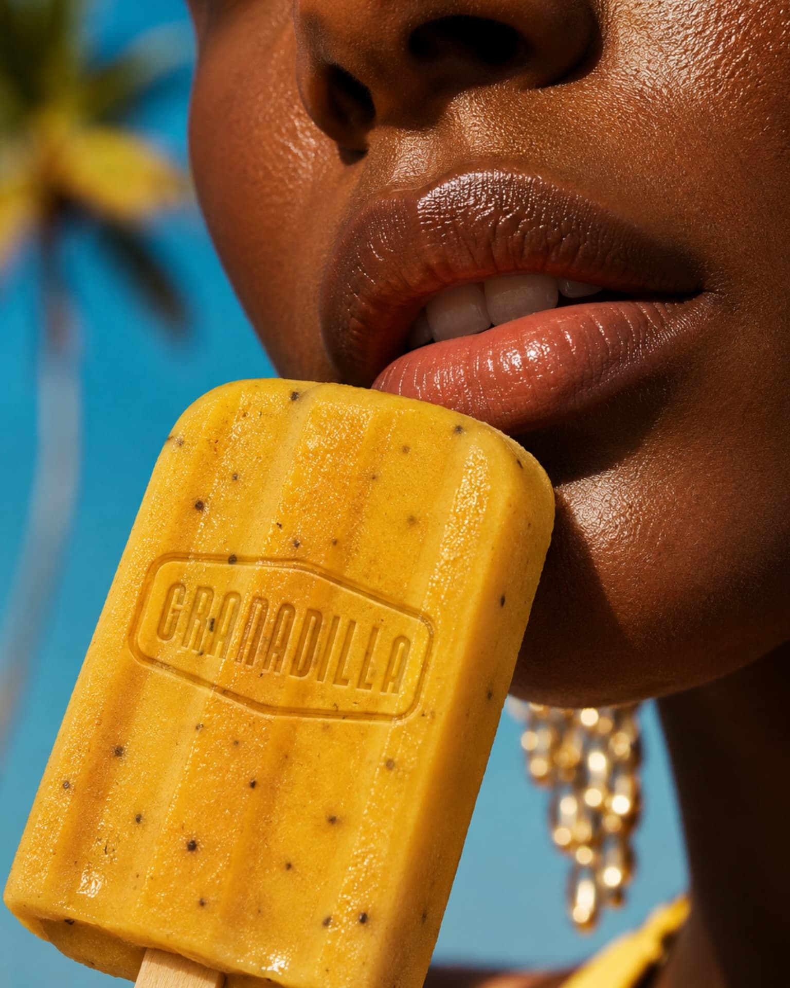 Close-up of a Granadilla embossed ice lolly against a blue sky